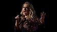 Adele opens the 59th Annual Grammy Awards show at the