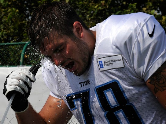 Titans offensive tackle Jack Conklin (78) cools off