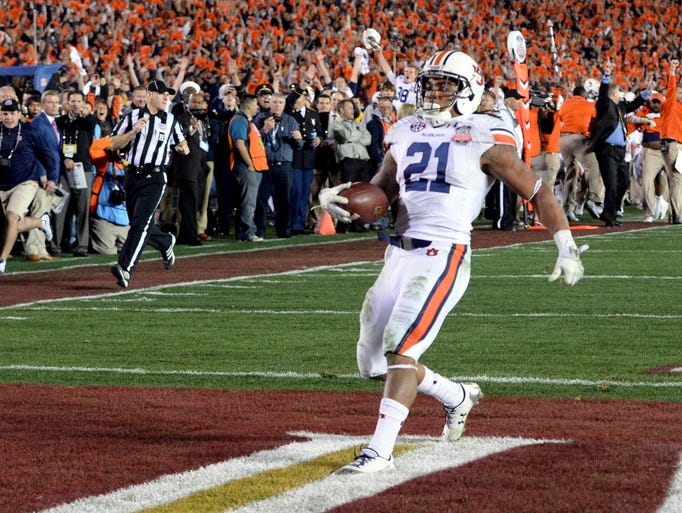 Auburn Tigers running back Tre Mason runs for a 37-yard touchdown with 1:19 remaining.