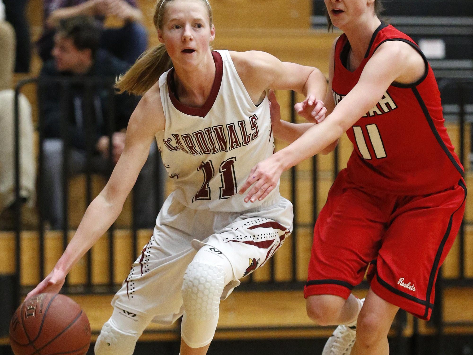 Fond du Lac girls basketball’s Ally Gietzel drives past Neenah’s Reagan Obry on Thursday during their game in Fond du Lac.