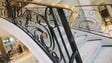 Elaborate iron and brass railings total 150 feet and