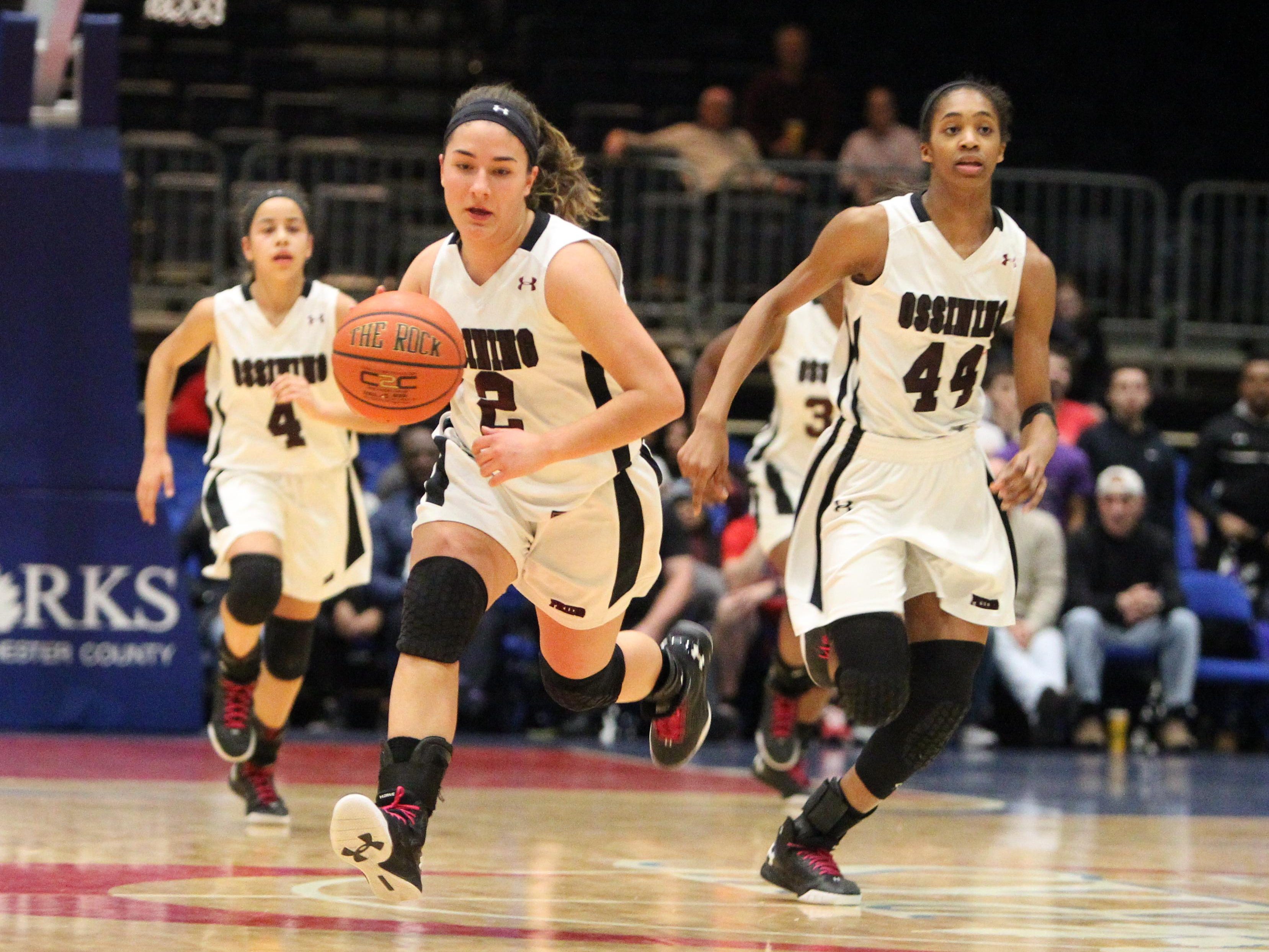 Ossining senior captain Gabby Ferrao brings the ball up during a 86-54 win over New Rochelle in a Section 1 Class AA girls basketball semifinal at the Westchester County Center Feb. 25, 2016.