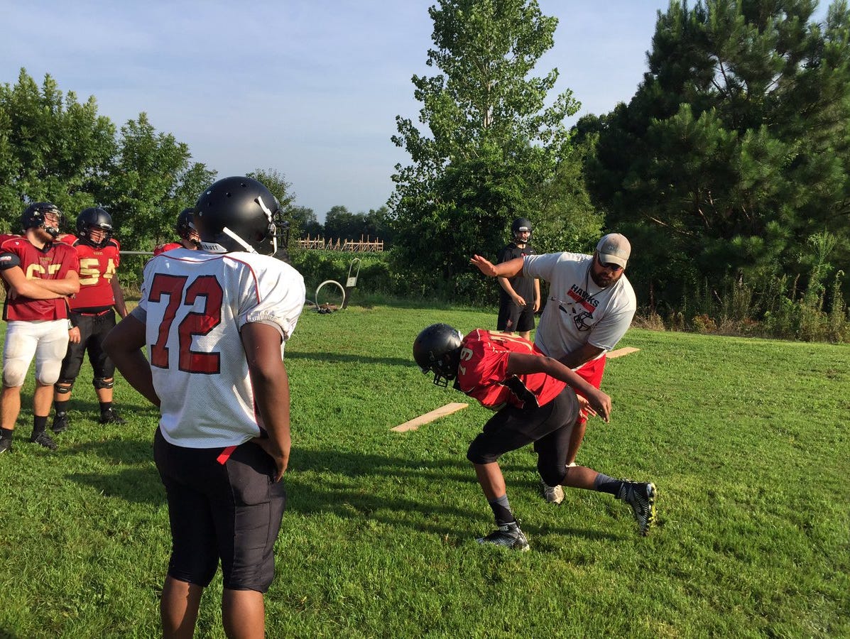 Rossview High football team trains with pads for first time this season on July 25, 2016.
