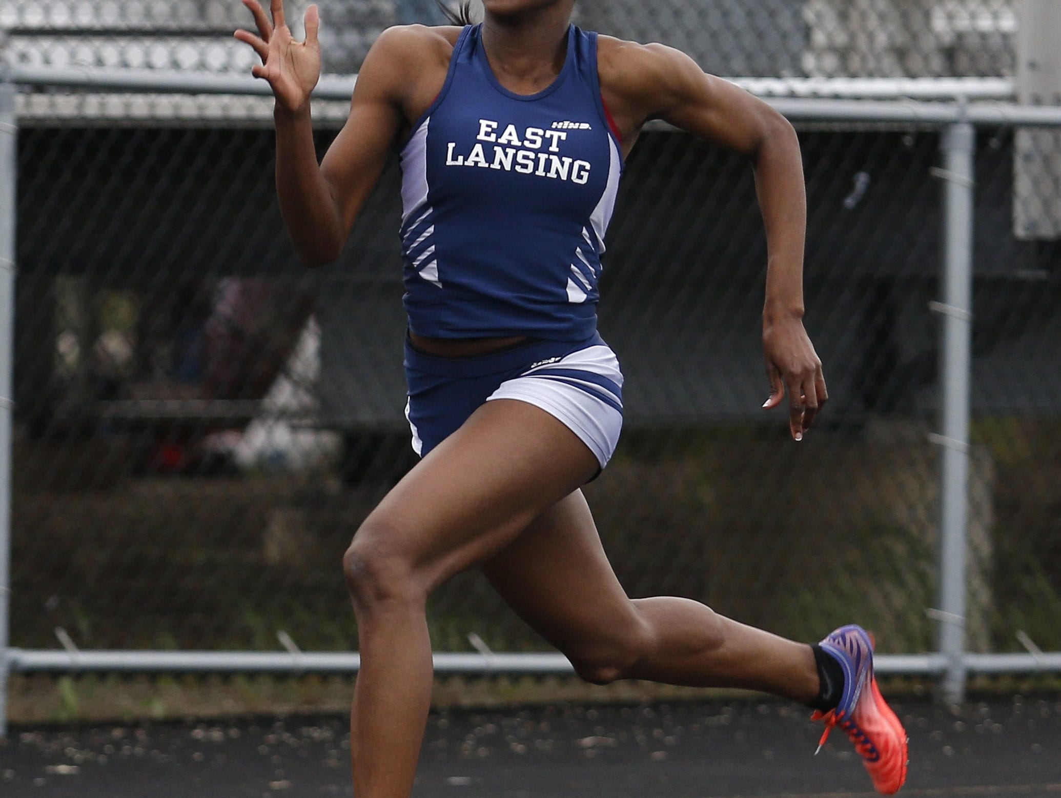 East Lansing's Taylor Manson, shown winning at the Division 1 regional May 20 in Holt, is named the State Journal's track and field athlete of the year after a record-setting junior season with the Trojans.
