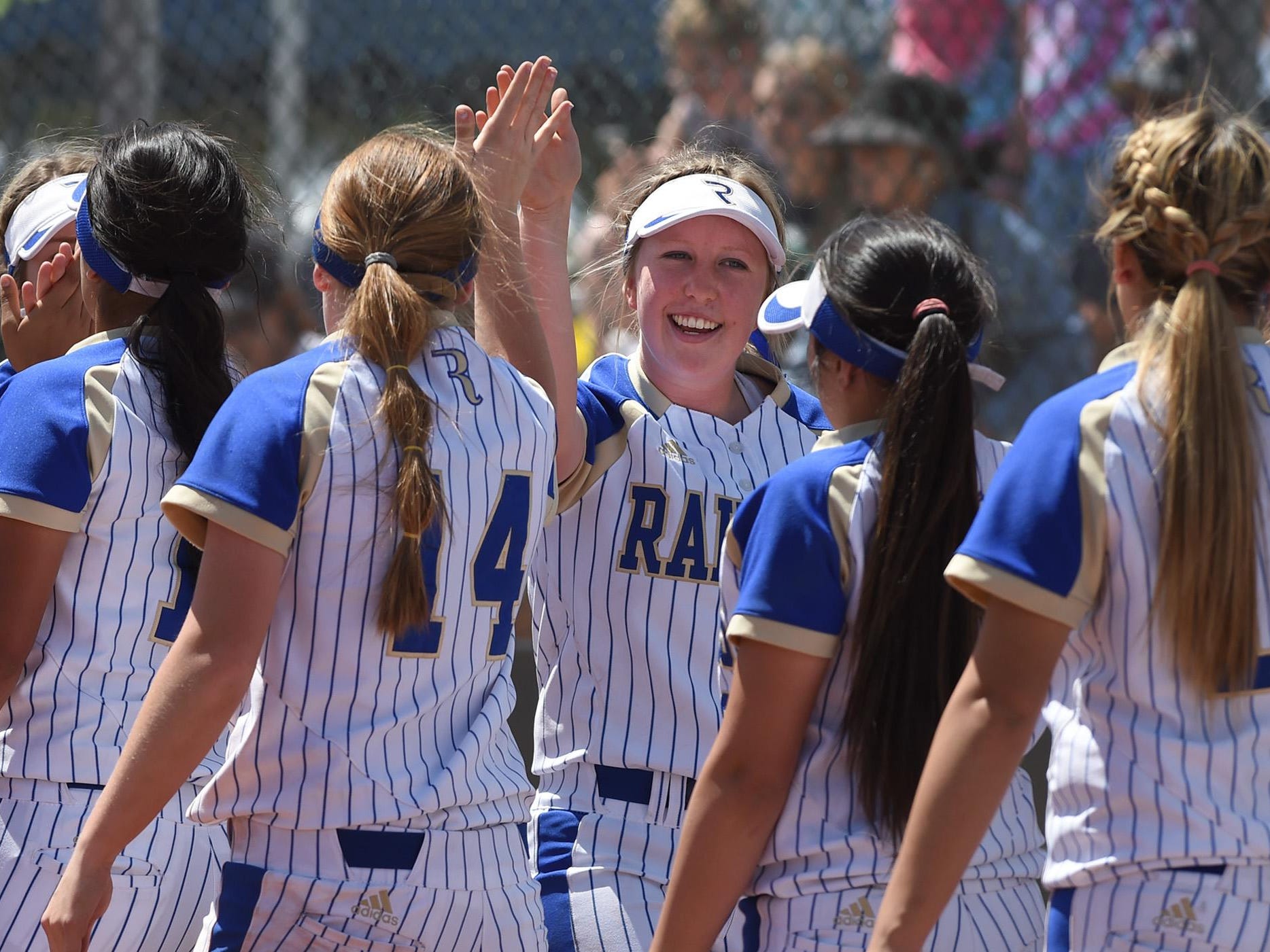 Reed celebrates its win against Bishop Manogue in the Northern Region tournament at Manogue on Thursday.