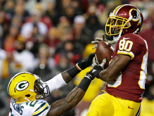  Washington Redskins wide receiver Jamison Crowder reels in a 44-yard touchdown pass while being covered by Green Bay Packers cornerback Quinten Rollins in the third quarter Sunday night at FedEx Field. (Photo: Mark Hoffman, Milwaukee Journal Sentinel) 