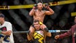 Jose Aldo reacts to his win over Frankie Edgar for