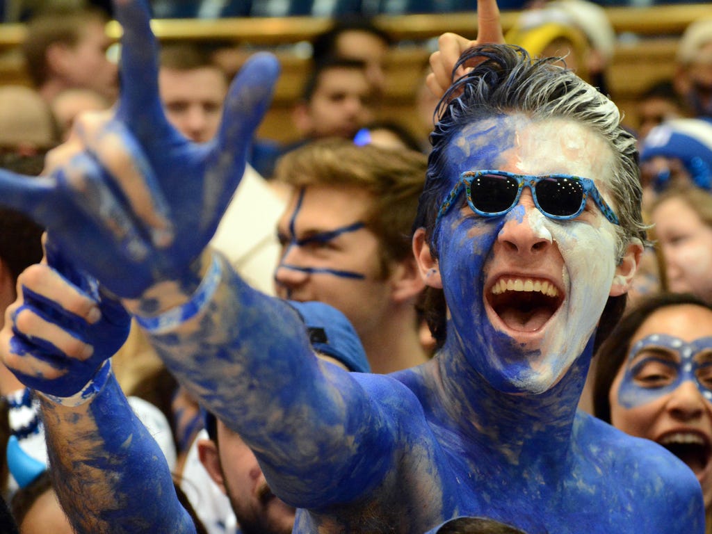 A Duke Blue Devils fan cheers prior to a game against the Virginia Cavaliers at Cameron Indoor Stadium in Durham, N.C.