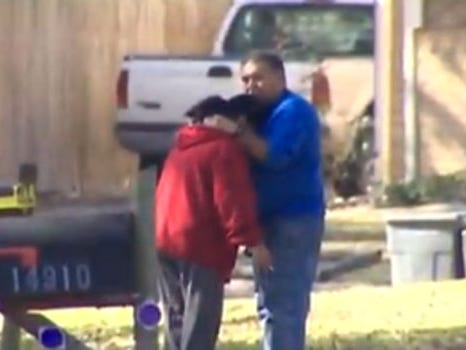 Unidentified relatives react after learning of a mother who police say repeatedly stabbed her 4-year-old son Feb. 26, 2015, in Houston.