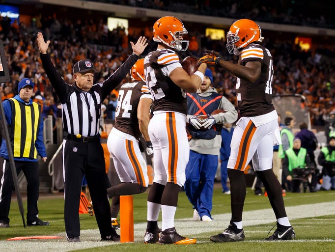 Nov 3, 2013; Cleveland, OH, USA; Cleveland Browns tight end Gary Barnidge (left) receives congratulations from wide receiver Josh Gordon (right) after scoring a touchdown in the third quarter against the Baltimore Ravens at FirstEnergy Stadium. Cleveland won 24-18. Mandatory Credit: Rick Osentoski-USA TODAY Sports