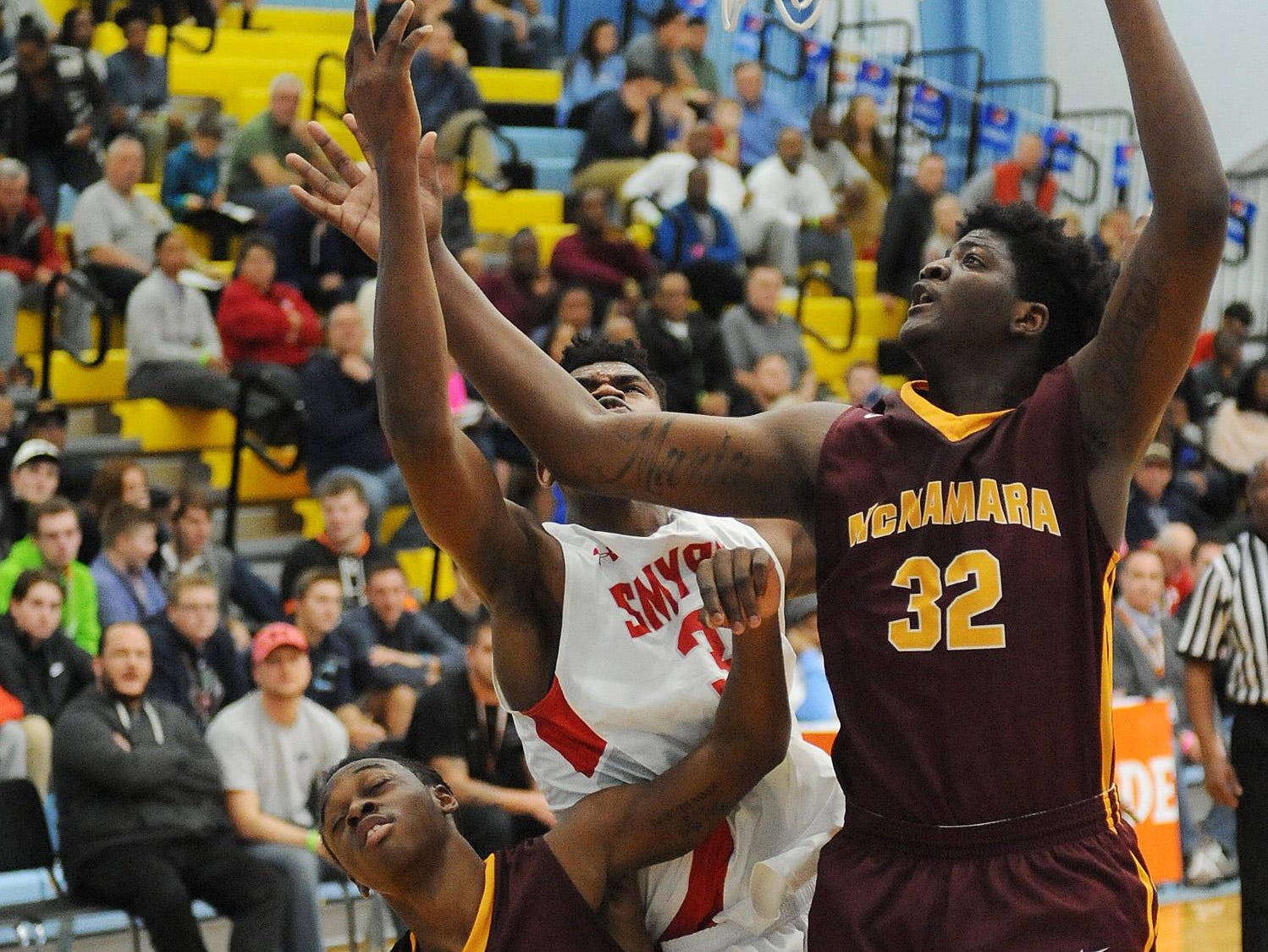 The Annual Slam Dunk to the Beach Basketball Tournament started at Cape Henlopen High School in Lewes on Tuesday December 27th with Smyrna HS (white) hosting Bishop McNamara HS from Forestville, Md.