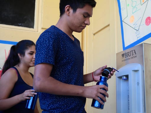 Students use Brita hydration station to access free