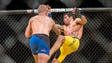 T.J. Dillashaw punches Raphael Assuncao during their