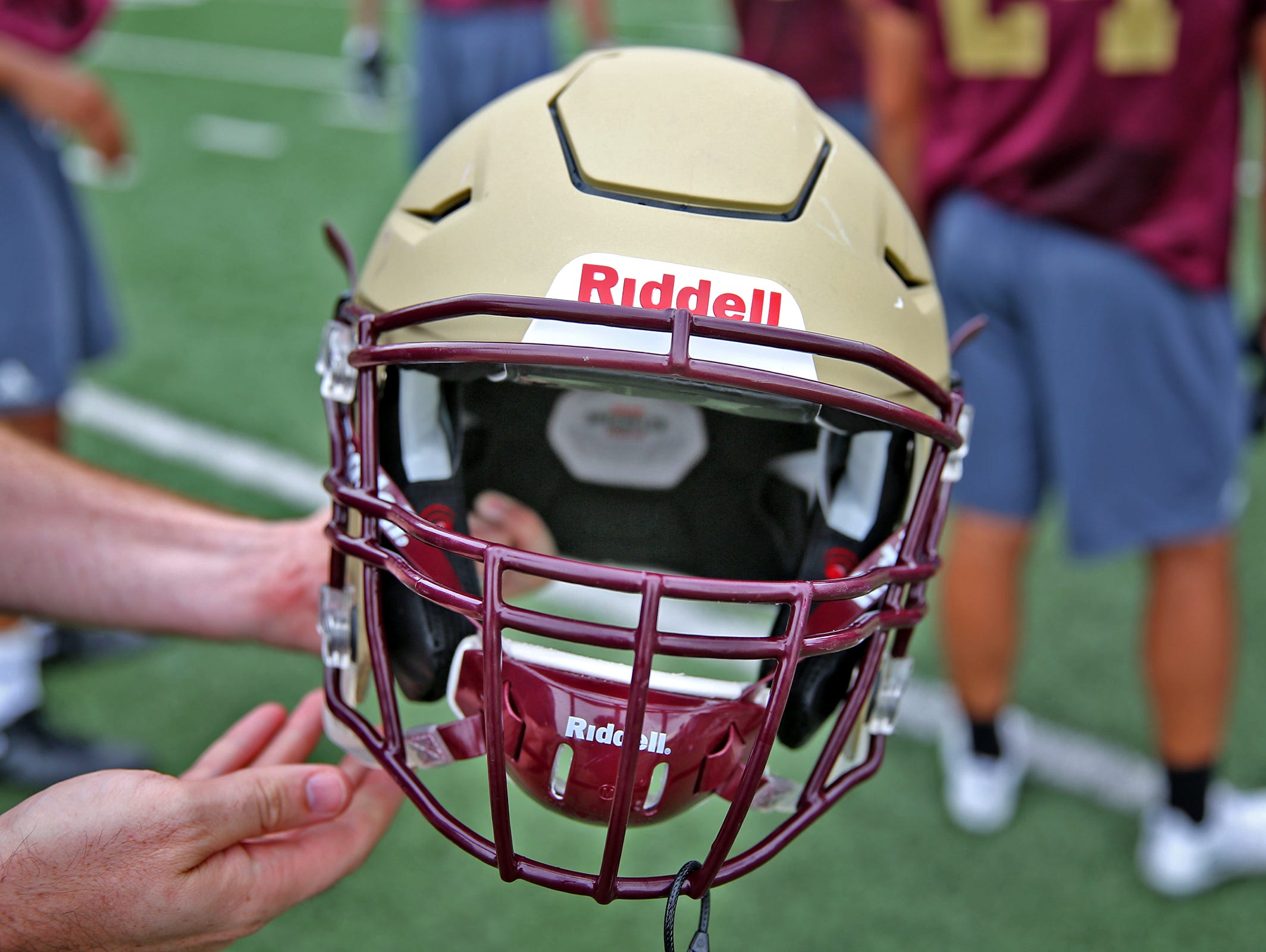Brebeuf football players wear Riddell helmets with InSite impact monitoring system which monitors impacts as they occur for players. Under padding inside are the sensors and the power source. If a player gets hit at a critical level, it will send an alert to the monitoring athletic trainer so that concussion protocol can be initiated. This is the first year that players will use the helmets.