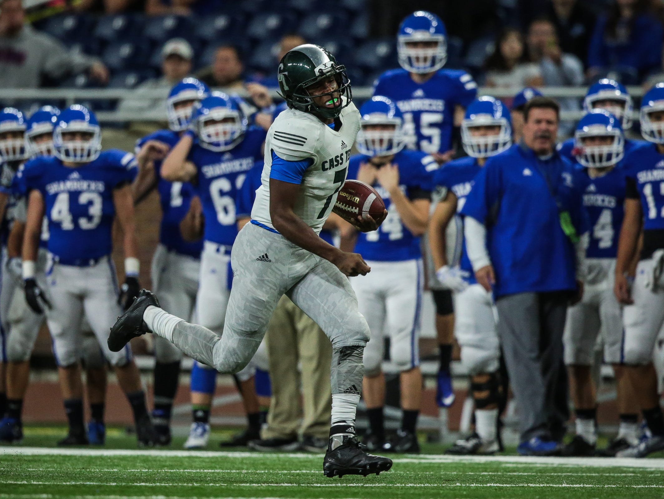 Detroit Cass Tech's Hall Rodney (7) runs the ball against Detroit Catholic Central during the Division 1 High School Championship game on Saturday November 26, 2016, at Ford Field in Detroit, MI.