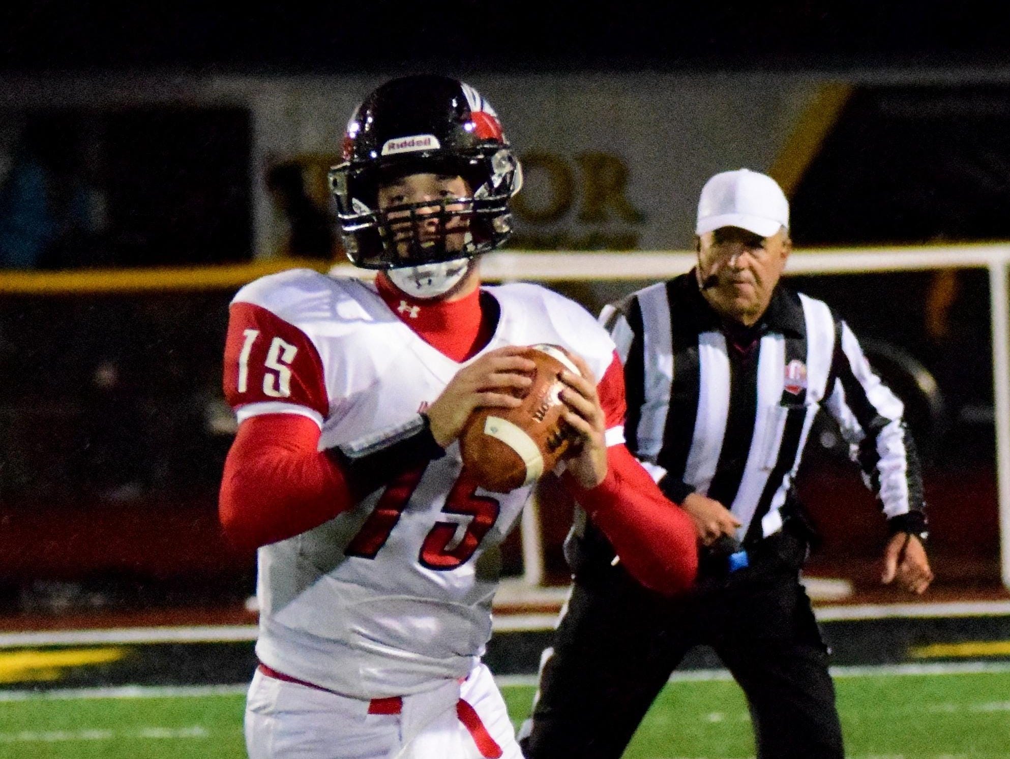 Indian Hill quarterback Reed Aichholz eyes an open receiver down field for the Braves. The lefty leads the CHL in passing yards.