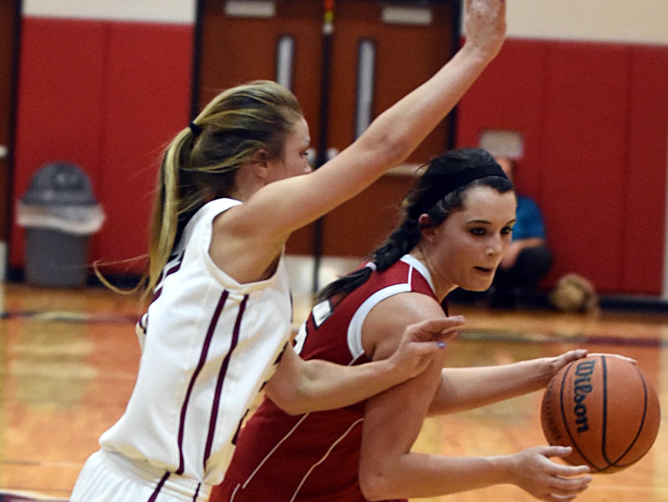 Westmoreland High junior forward Kaitlyn Norman dribbles into the lane as Cheatham County junior Josie Bumpus defends. Norman scored a game-high 19 points in the Lady Eagles' 51-46 loss on Saturday evening.