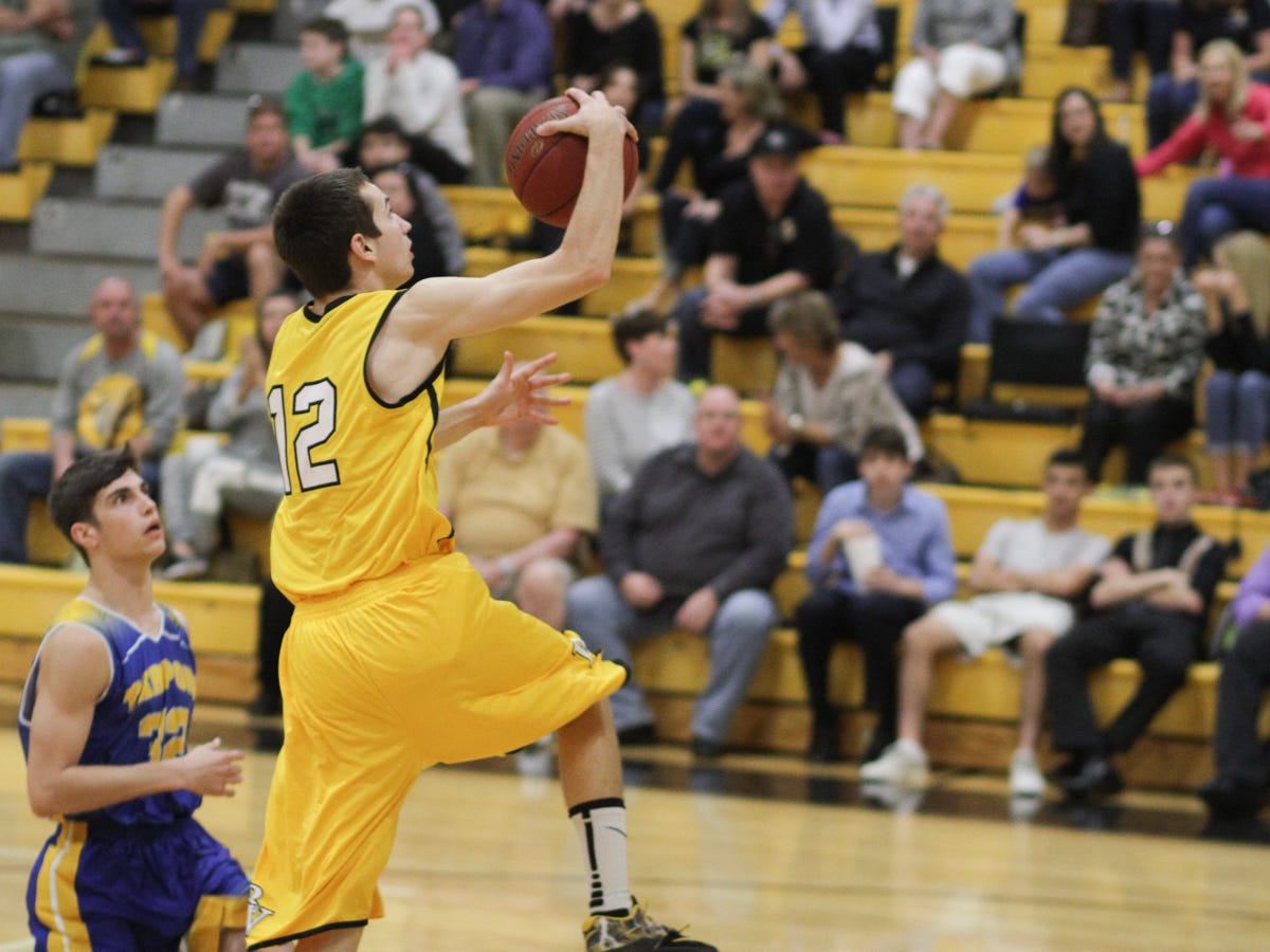 Bishop Verot senior Thaddeus Ward goes up for a layup on Jan. 22 against Charlotte on senior night. The Vikings lost 68-65.