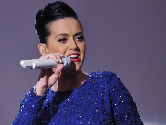 Singer Katy Perry performs at a concert in celebration of the Special Olympics on July 31, 2014 in the East Room of the White House in Washington, DC. AFP PHOTO/Mandel NGAN        (Photo credit should read MANDEL NGAN/AFP/Getty Images)