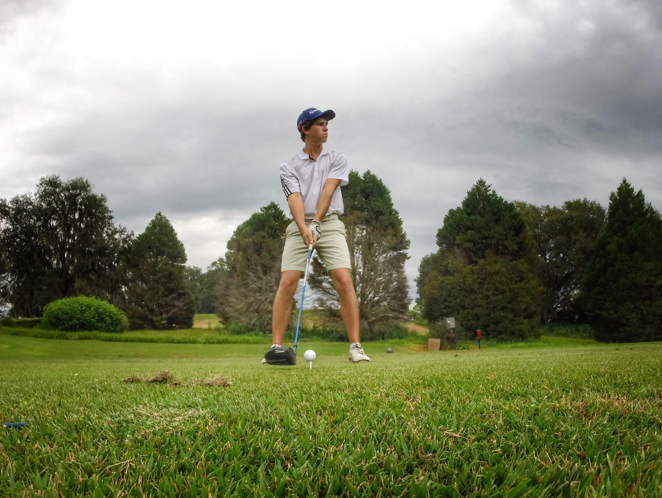 Maclay sophomore Bryson Bianco eyeballs his tee shot with driver during a round at Seminole Golf Course last week.