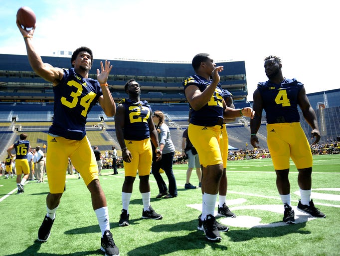 Michigan defensive back Jeremy Clark (34) throws the