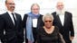 Maya Angelou, sitting, Junot Diaz, left, Norman Mailer and Lawrence Schiller pose for photographs during the 5th annual Norman Mailer Center benefit gala on Oct. 17, 2013, at the New York Public Library.