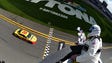 Joey Logano takes the checkered flag after completing