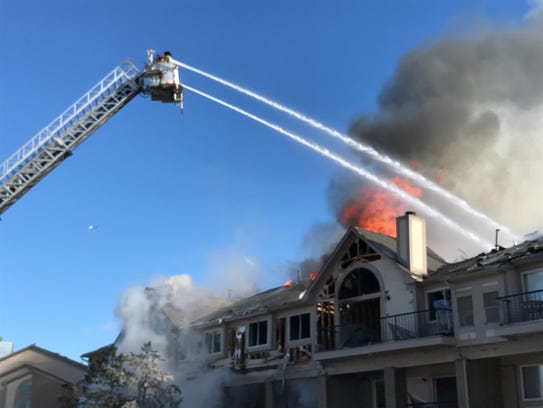 Farmington Hills firefighters helped battle an apartment