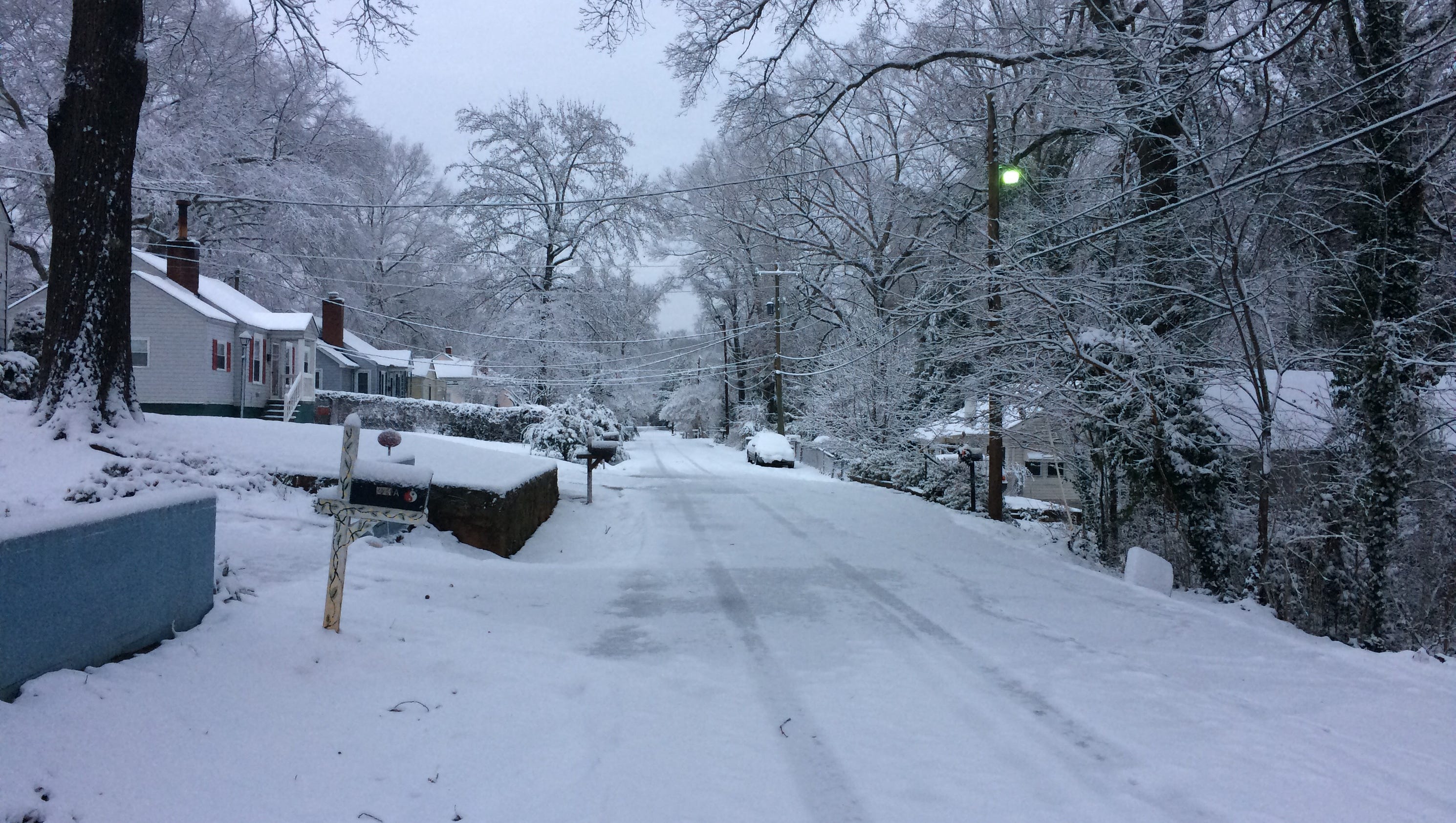 Travelers moving slowly after snow from Winter Storm Helena blankets