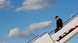 Trump walks down the stairs of Air Force One during