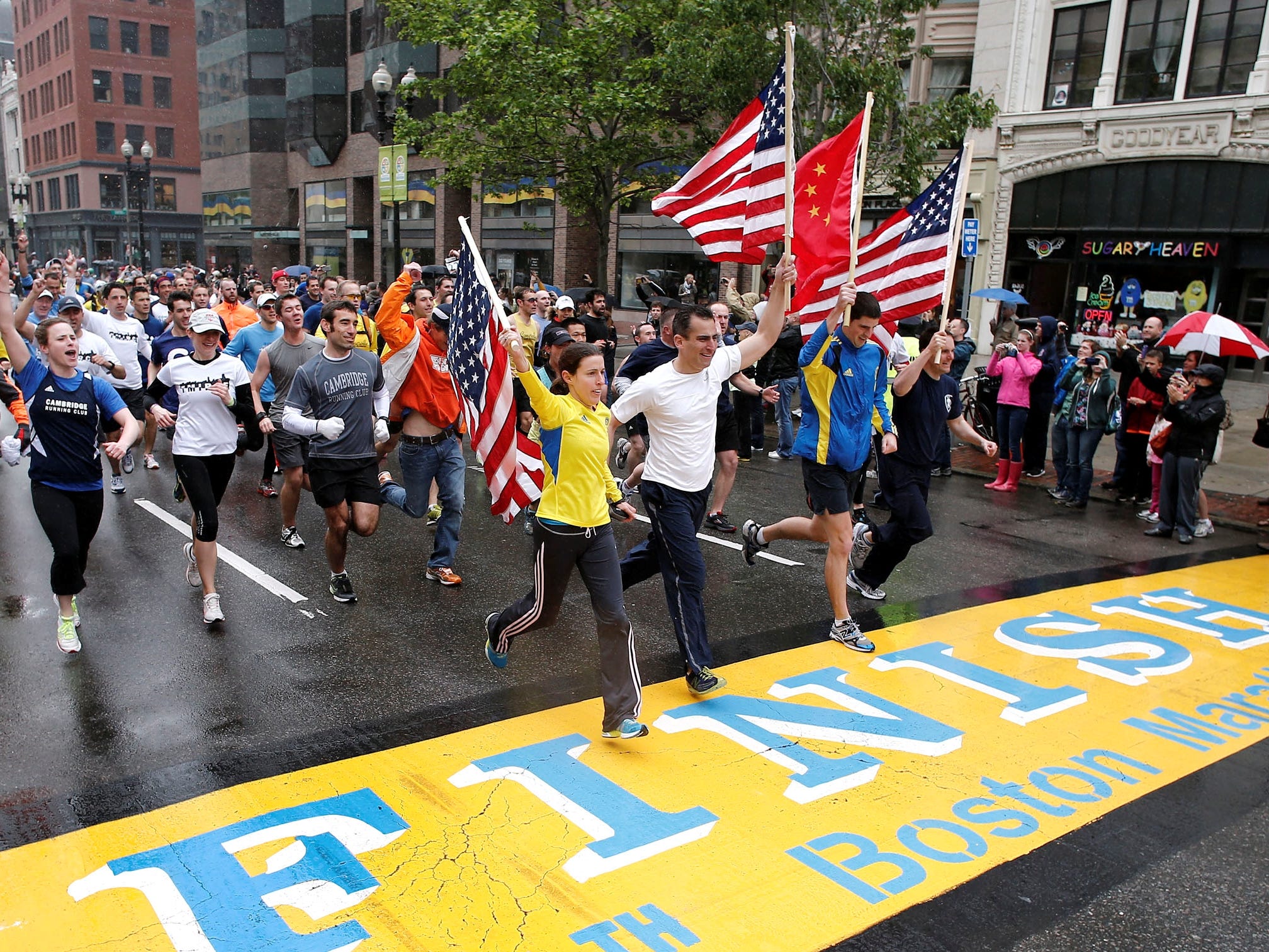 Thousands run final mile of Boston Marathon