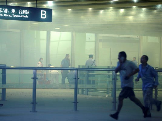 1374322570000-AP-China-Beijing-Airport-Explosion-1307200817_4_3.jpg