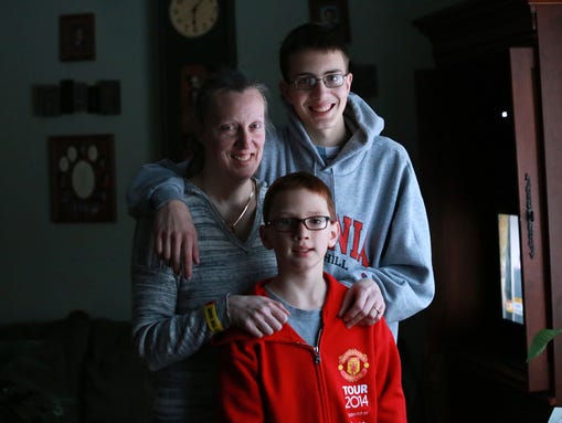Kris Bieniewicz, left, and her two sons Josh Bieniewicz,