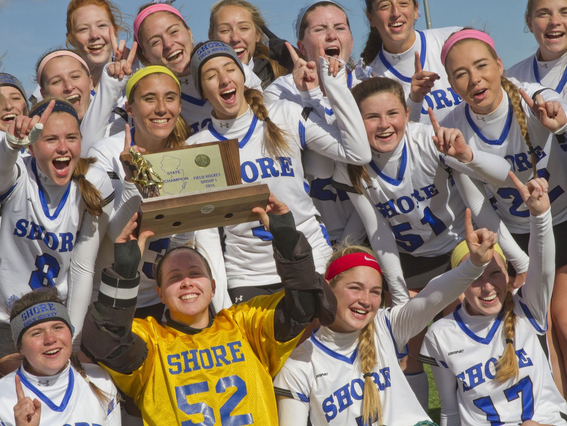 The Shore field hockey teams celebrates after winning the NJSIAA Group 1 state title on Nov. 14, 2015 at Bordentown Regional High School.
