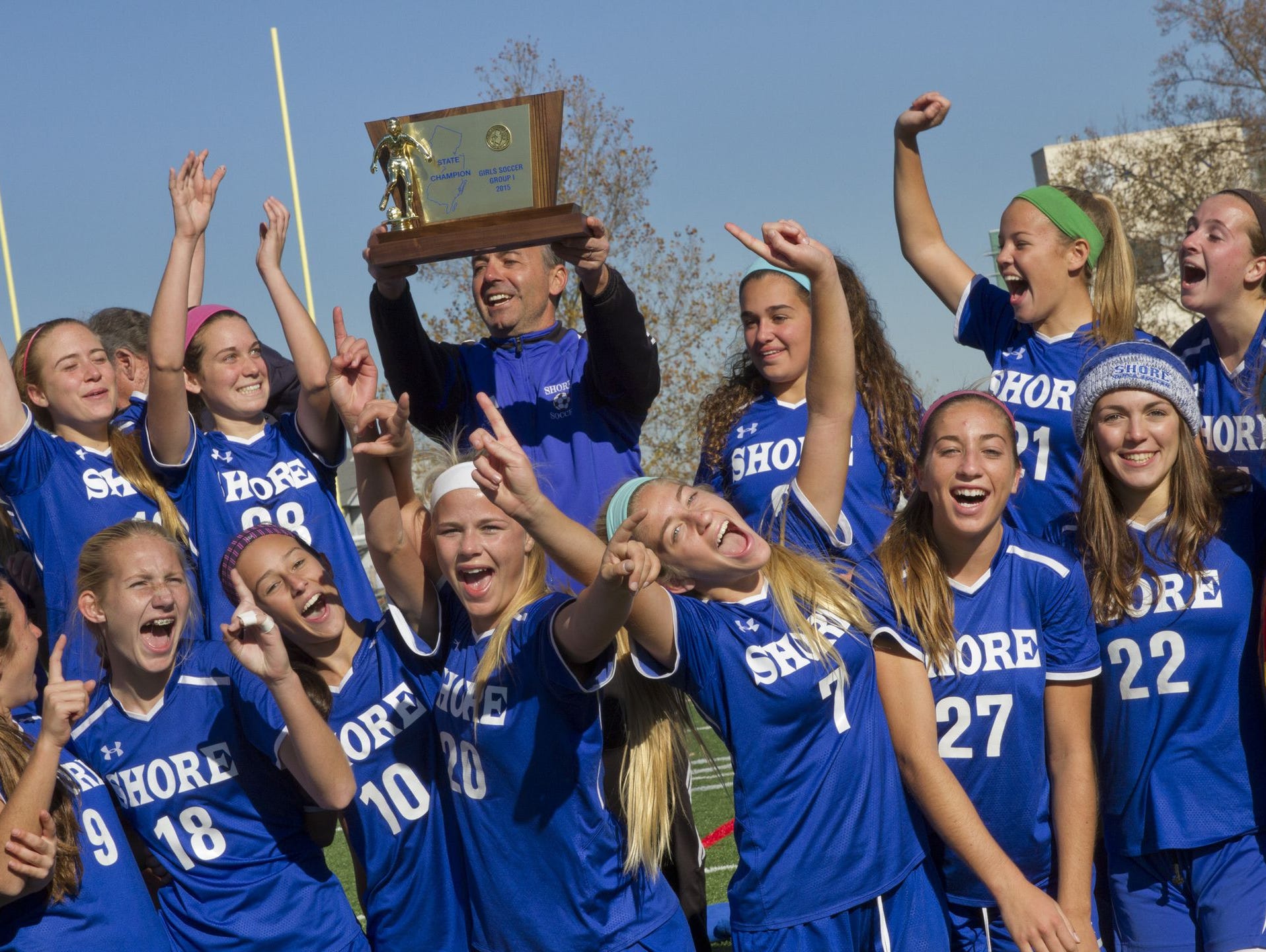 The 2015 Shore Regional girls soccer team celebrates winning the Group 1 state title on Nov. 21, 2015 at Kean University