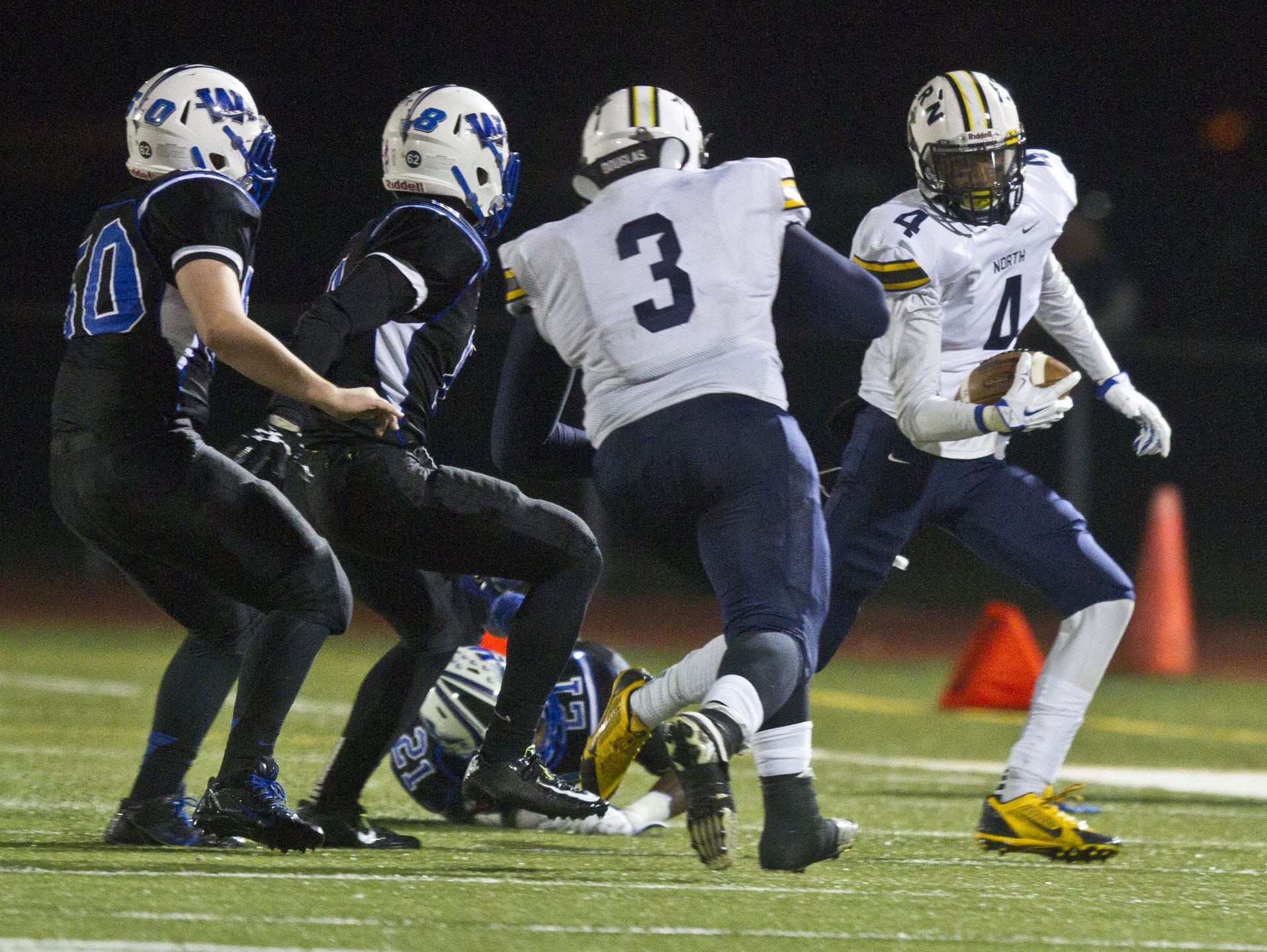 Toms River North's Darrion Carrington makes a key reception against Williamstown as Toms River North defeats Williamstown for the NJSIAA Group V State Championship title. Glassboro, NJ Saturday, December 5, 2015