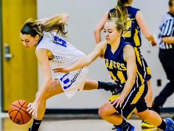Tessa Hosford ,left, of Bath steals the ball from Brenna Wirth ,right, of Pewamo-Westphalia in the 1st half of their game Tuesday.