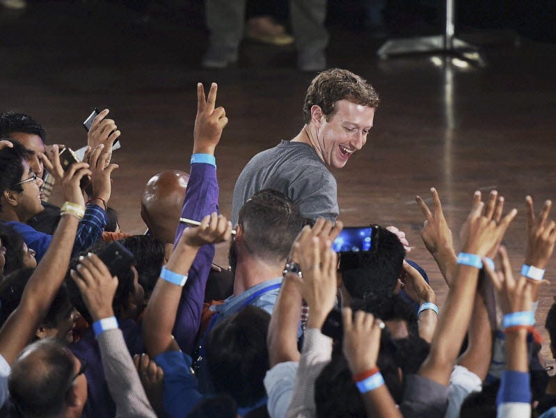 Facebook CEO Mark Zuckerberg interacts with technology students in a town hall-style meeting in New Delhi, India this week.
