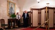 Trump gestures as he surprises visitors during the