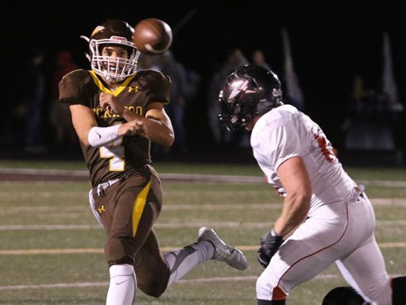 Chris Lawson (left) and the Kickapoo Chiefs reached the Class 6 playoff semifinals in 2015.