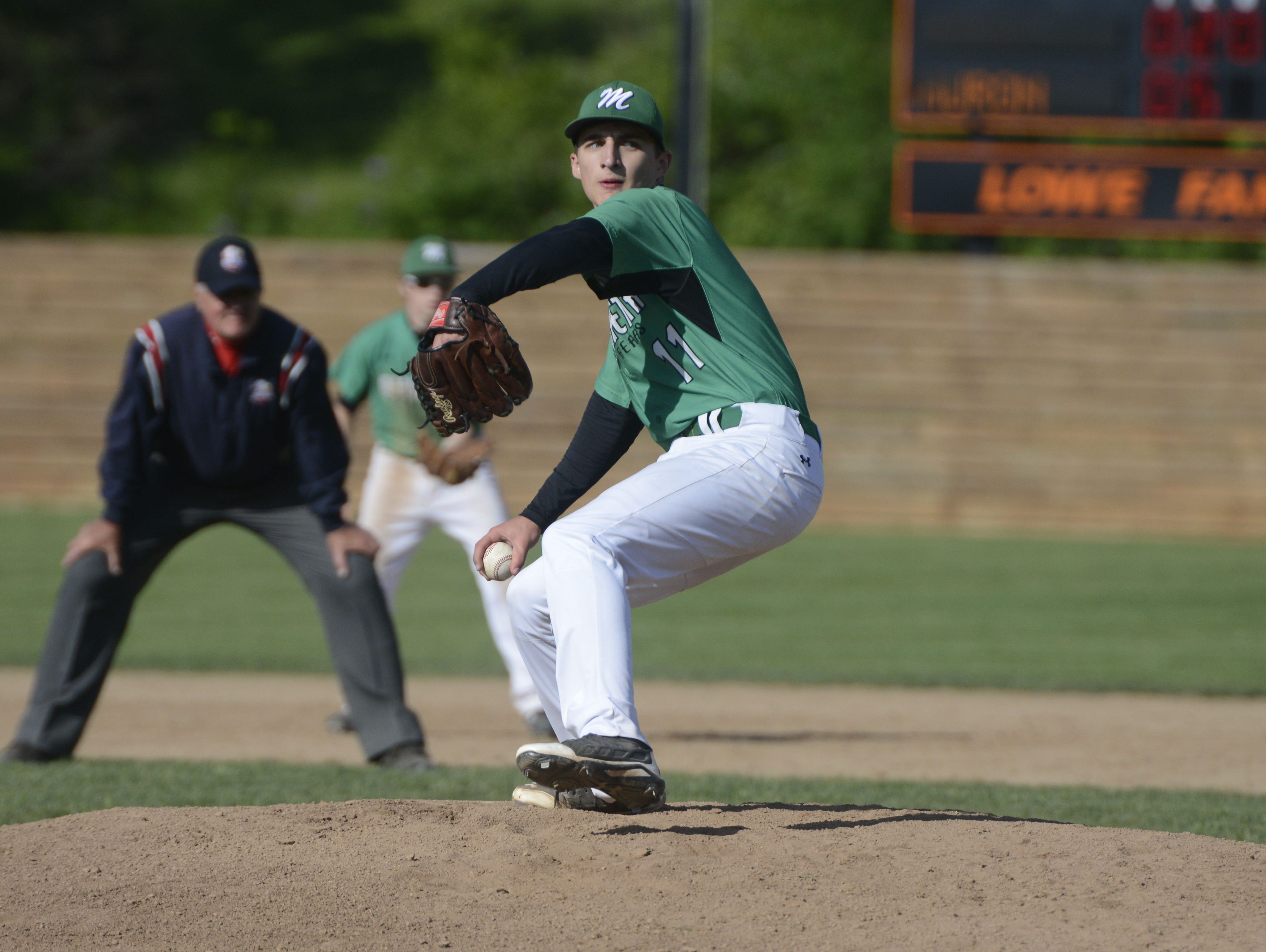 Margaretta's James Fisher pitches against Huron on Thursday afternoon in a Division III district semifinal. Huron won 8-5.