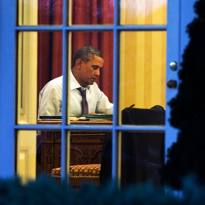 President Obama working Monday on the State of the Union speech.