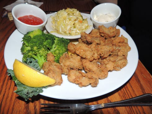 Fresh local oysters breaded and fried and served with delicious cole slaw reminiscent of kimchi is one of Hudson's many seafood specialties.