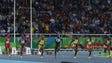 Runners get off the blocks in the women's 100-meter