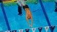 Jacob Pebley swims during the men's 200-meter backstroke