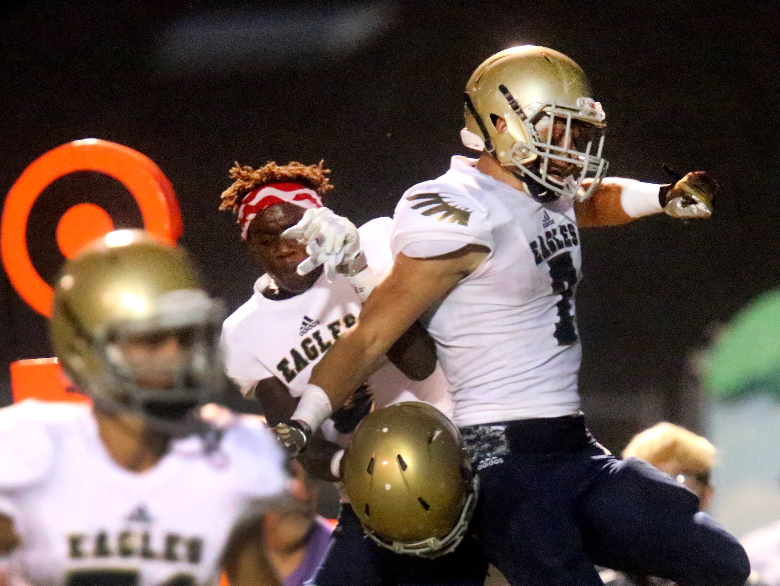 Independence senior Landon Guidry (7) celebrates a touchdown against Smyrna.