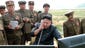 Kim Jong-Un attends the test firing of a new high-performance tactical rocket on Aug. 15.