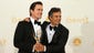 Matt Bomer, left and Mark Ruffalo pose in the photo room with their award for Outstanding Television Movie for "The Normal Heart" at the 66th annual Emmy Awards at the Nokia Theater on Aug. 25, 2014.