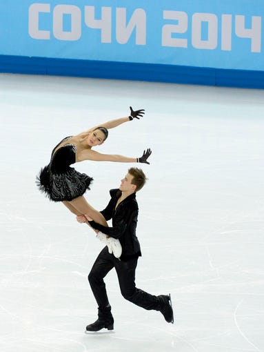 Elena Ilinykh and Nikita Katsalapov (RUS) perform in the team ice dance free dance.