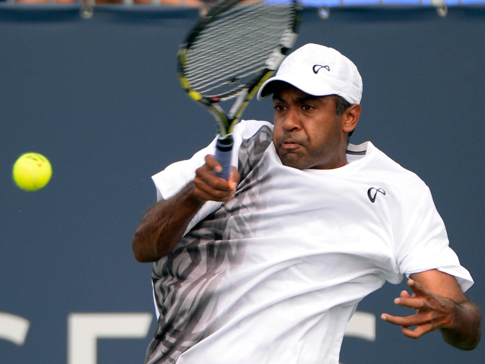 FILE -- Rajeev Ram of the United States hits a forehand.